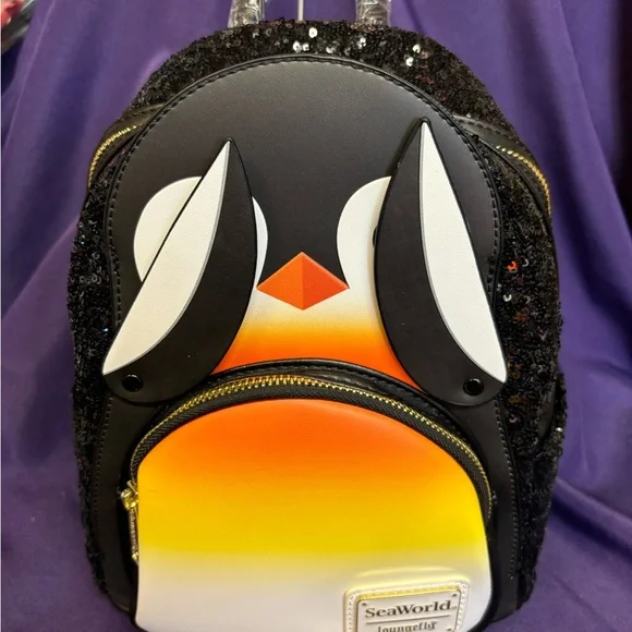 Loungefly Black and Orange Penguin Backpack Sparkly Design - Picture 2 of 4